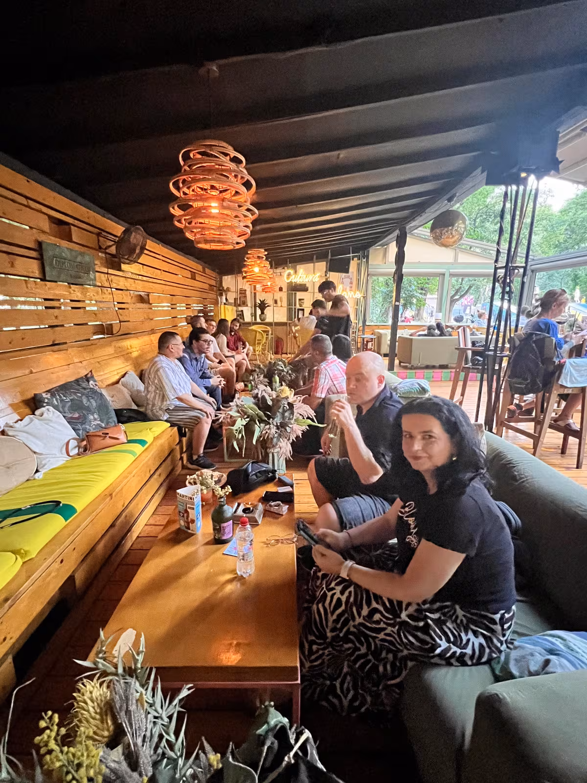 An evening meetup on a covered terrace